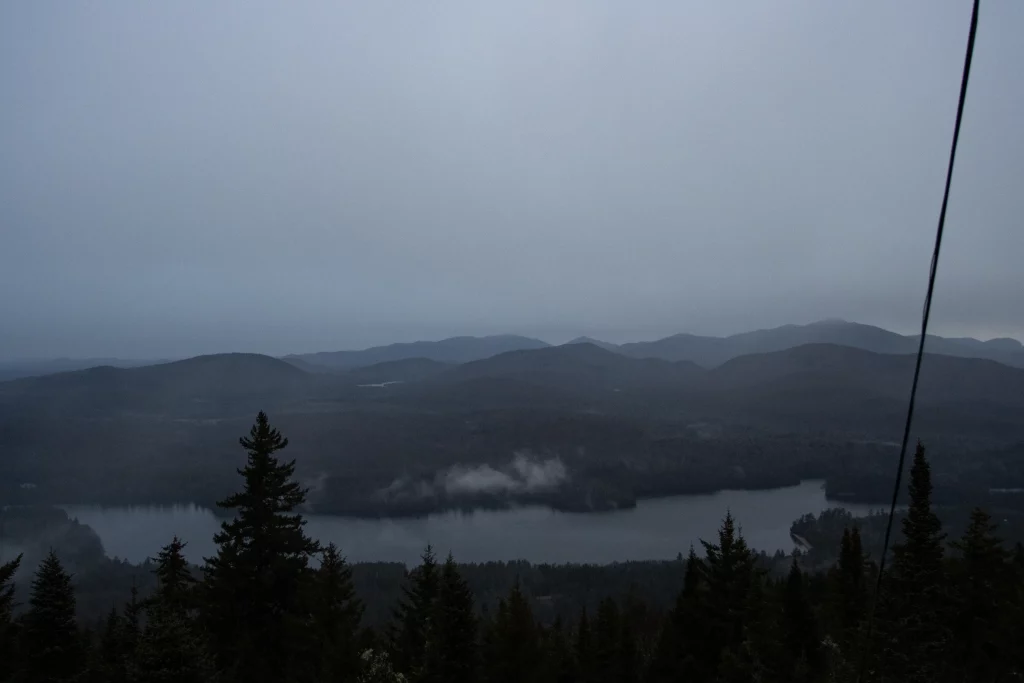 Nearby lakes become visible once you climb the tower over the tree line.