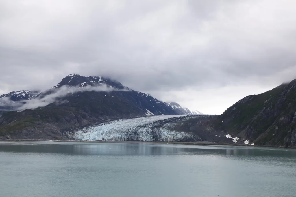 A wider view of the glacier, with visibility of sediment and the receding ice.